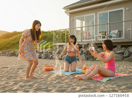 Girls enjoying summer vacation at a seaside pension 127160458
