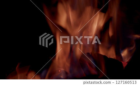 Captivating and Beautiful Flames Are Dancing Gracefully in the Darkness of the Night Sky 127160513