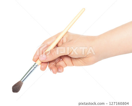 Woman hand holds paint brush, isolated on transparent background, painting and design concept Woman hand holds paint brush, isolated on transparent background, painting and design concept 127160804