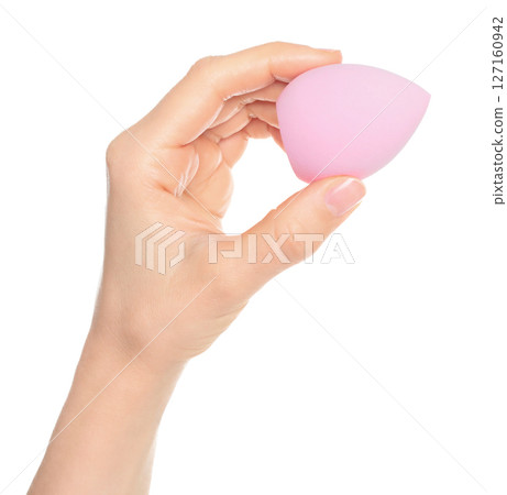 Woman Hand holds a cosmetic sponge, isolated on transparent background close-up, template for cosmetics ads Woman Hand holds a cosmetic sponge, isolated on transparent background close-up, template for cosmetics ads 127160942