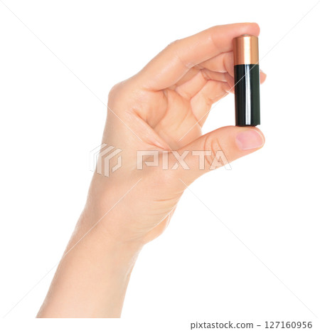 Woman Hand holds a Battery, isolated on transparent background close-up, template for energy saving ads Woman Hand holds a Battery, isolated on transparent background close-up, template for energy saving ads 127160956