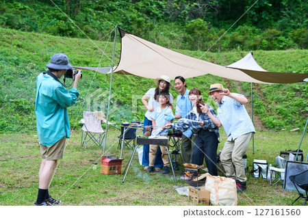 3 generations camping outdoor barbecue BBQ family colleagues friends 3 generations camping outdoor barbecue BBQ family colleagues friends 127161560