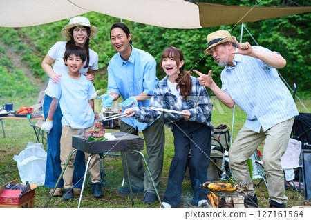 3 generations camping outdoor barbecue BBQ family colleagues friends 3 generations camping outdoor barbecue BBQ family colleagues friends 127161564
