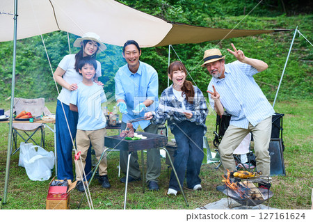 3 generations camping outdoor barbecue BBQ family colleagues friends 127161624