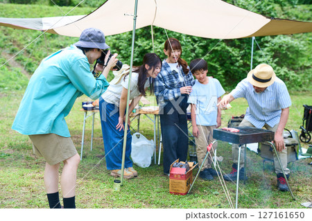 3 generations camping outdoor barbecue BBQ family colleagues friends 3 generations camping outdoor barbecue BBQ family colleagues friends 127161650
