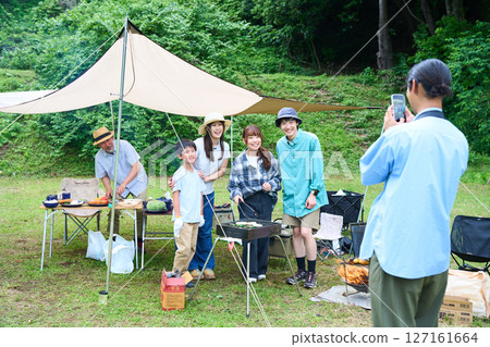 3 generations camping outdoor barbecue BBQ family colleagues friends 3 generations camping outdoor barbecue BBQ family colleagues friends 127161664