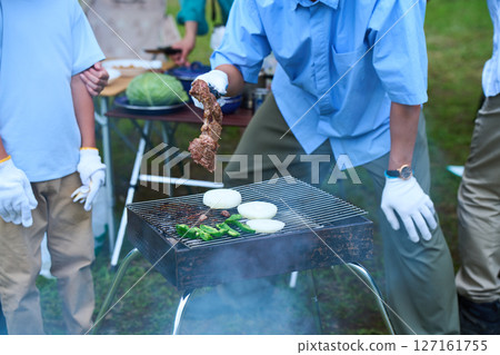 3 generations camping outdoor barbecue BBQ family colleagues friends 3 generations camping outdoor barbecue BBQ family colleagues friends 127161755