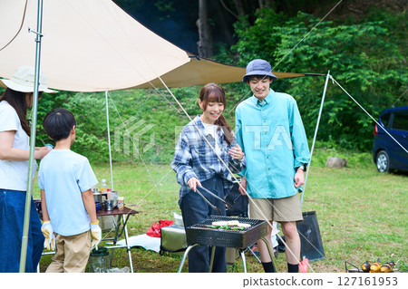 3 generations camping outdoor barbecue BBQ family colleagues friends 3 generations camping outdoor barbecue BBQ family colleagues friends 127161953