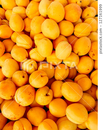 lots of apricot berry fruits for food as background 127161999