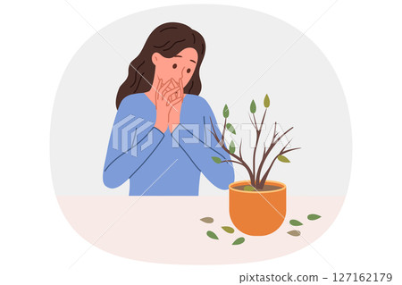 Dried out houseplant in pot causes stress to upset woman who is interested in botany 127162179