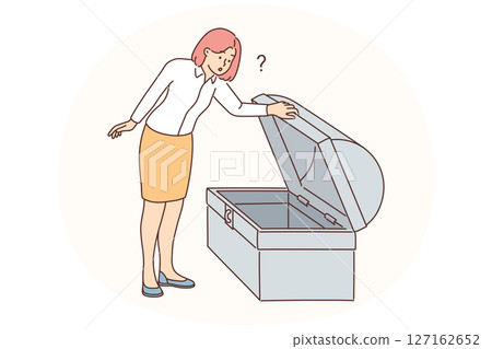 Businesswoman look in empty treasury chest 127162652