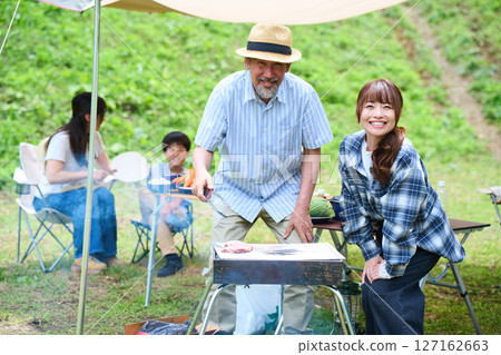 3 generations camping outdoor barbecue BBQ family colleagues friends 3 generations camping outdoor barbecue BBQ family colleagues friends 127162663