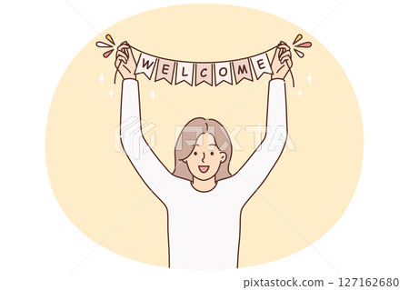 Smiling woman with welcome sign in hands 127162680