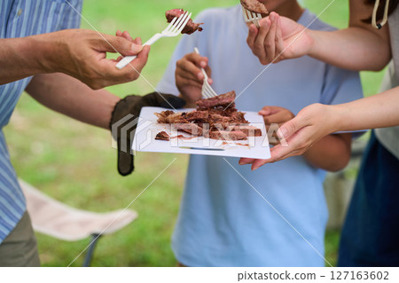 3 generations camping outdoor barbecue BBQ family colleagues friends 127163602