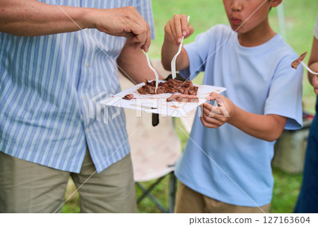 3 generations camping outdoor barbecue BBQ family colleagues friends 3 generations camping outdoor barbecue BBQ family colleagues friends 127163604