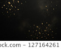 Gold powder and steam flying on a black background (food background) 127164261