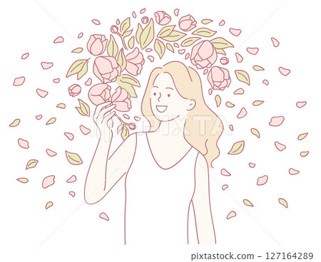 A Joyful Woman Surrounded by Beautiful and Colorful Flowers in a Serene Outdoor Setting 127164289