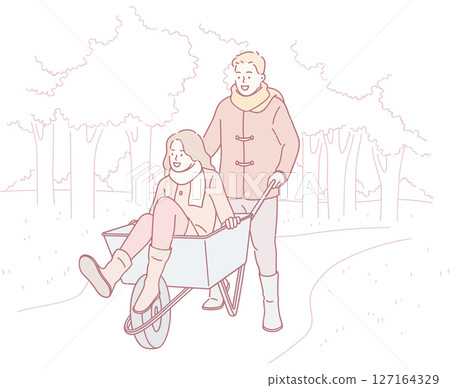 Experience a Joyful Wheelbarrow Ride in Nature, full of laughter and happiness for everyone 127164329