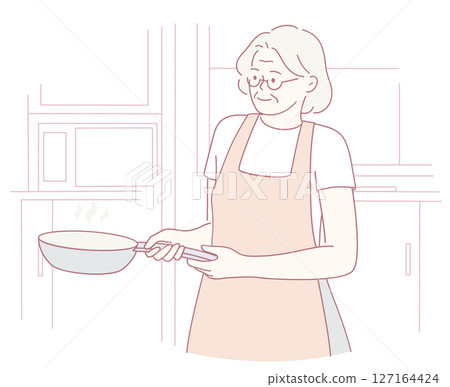 An elderly woman engaging in the delightful activity of cooking in her kitchen using a frying pan 127164424