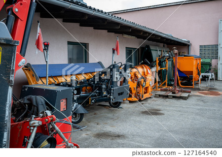Snow clearing and road maintenance equipment , concept of municipal equipment storage 127164540