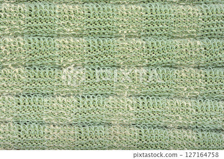 Green knitted fabric Green knitted fabric 127164758