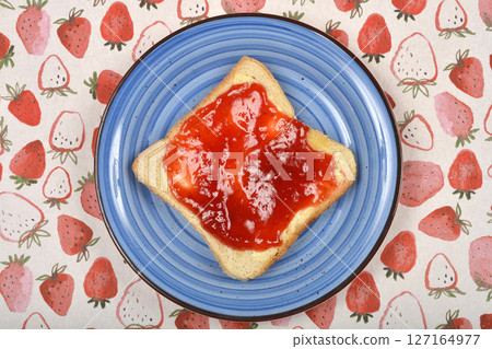 Toast with red strawberry jam 127164977