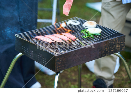 Camping, outdoor, barbecue, BBQ, grilled meat, charcoal fire Camping, outdoor, barbecue, BBQ, grilled meat, charcoal fire 127166037