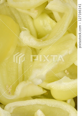 Sliced pale yellow peppers Sliced pale yellow peppers 127166141