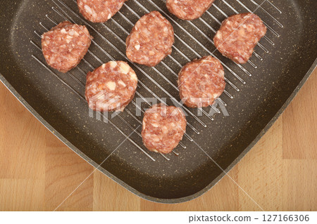 Savory minced meat and cheese patties Savory minced meat and cheese patties 127166306