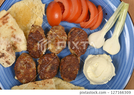Savory minced meat and cheese patties Savory minced meat and cheese patties 127166309