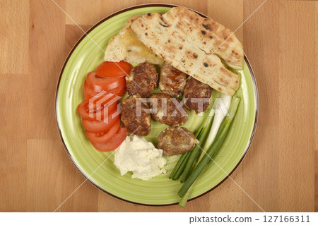 Savory minced meat and cheese patties Savory minced meat and cheese patties 127166311