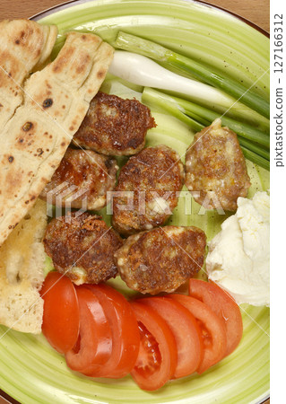 Savory minced meat and cheese patties Savory minced meat and cheese patties 127166312