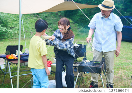 3 generations camping outdoor barbecue BBQ family colleagues friends 3 generations camping outdoor barbecue BBQ family colleagues friends 127166674