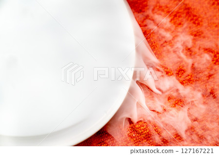 A photo of dry ice in water. 127167221