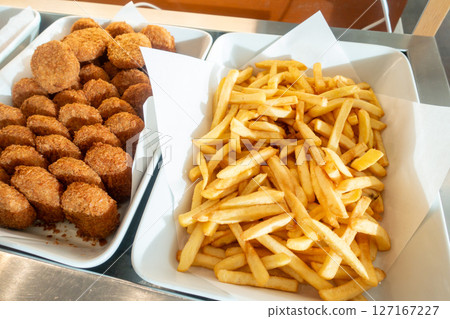 A photo of a hotel buffet. An image of an all-you-can-eat buffet. A photo of a hotel buffet. An image of an all-you-can-eat buffet. 127167227