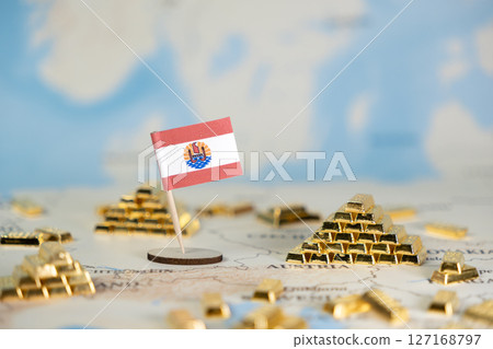 French Polynesia flag positioned on a world map surrounded by shining gold bars, symbolizing global wealth, international finance, and precious metal investment French Polynesia flag positioned on a world map surrounded by shining gold bars, symbolizing global wealth, international finance, and precious metal investment 127168797