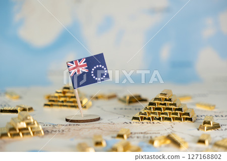Cook Islands flag, glittering gold bars on world map, symbolizing national wealth, global investment, economic development, and financial stability 127168802