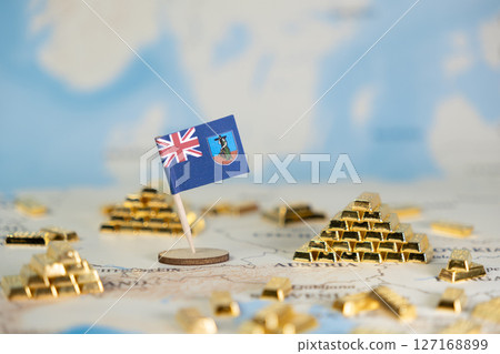 Montserrat flag prominently displayed on a global map, surrounded by shining gold bars, representing international financial investment, national economic stability, and wealth management 127168899