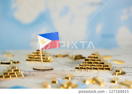 Philippine flag on global map with gold bars, symbolizing national wealth, economic growth, and strong international trade Philippine flag on global map with gold bars, symbolizing national wealth, economic growth, and strong international trade 127168915