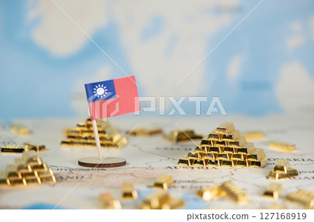 Taiwan's flag with numerous golden bars on a world map, representing national economic power, global financial investment, and international trade strategy 127168919
