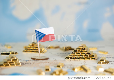Czech Republic flag proudly stands amidst golden bars on a world map, representing national economic strength, financial security, and global wealth investment opportunities 127168962