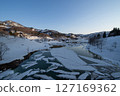 Hama River Dam snow flow in the evening (Oshirakawa, Uonuma City, Niigata Prefecture) 127169362