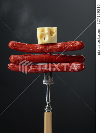 Thin grilled sausages with cheese. Thin grilled sausages with cheese. 127169816