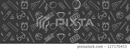 Seamless repeating pattern of school supplies on dark background. Chalk drawings on school board. 127170453