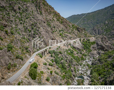 Camping Caravan driving through Canyon de la Ruda road Corsica down the pass monte Cino Camping Caravan driving through Canyon de la Ruda road Corsica down the pass monte Cino 127171138