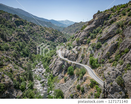 Camping Caravan driving through Canyon de la Ruda road Corsica down the pass monte Cino 127171140