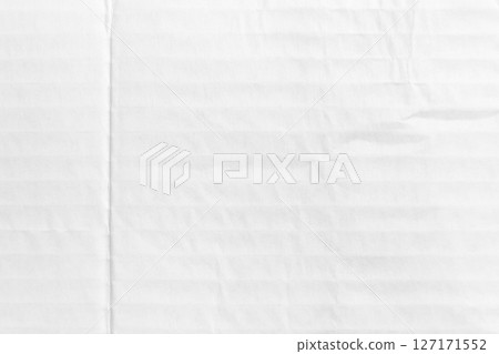 Abstract white background of crumpled soft packaging protective paper. Cardboard parcel material Abstract white background of crumpled soft packaging protective paper. Cardboard parcel material 127171552