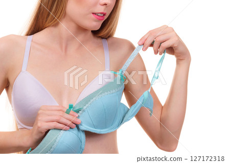 Woman choosing underwired bra 127172318
