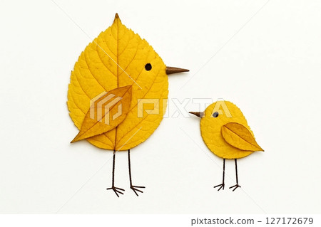 Whimsical Leaf Birds Artwork Made from Yellow Autumn Leaves 127172679