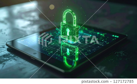 Digital security concept with a glowing green padlock hologram emerging from a smartphone screen on a reflective surface showing cybersecurity protection and data privacy 127172785
